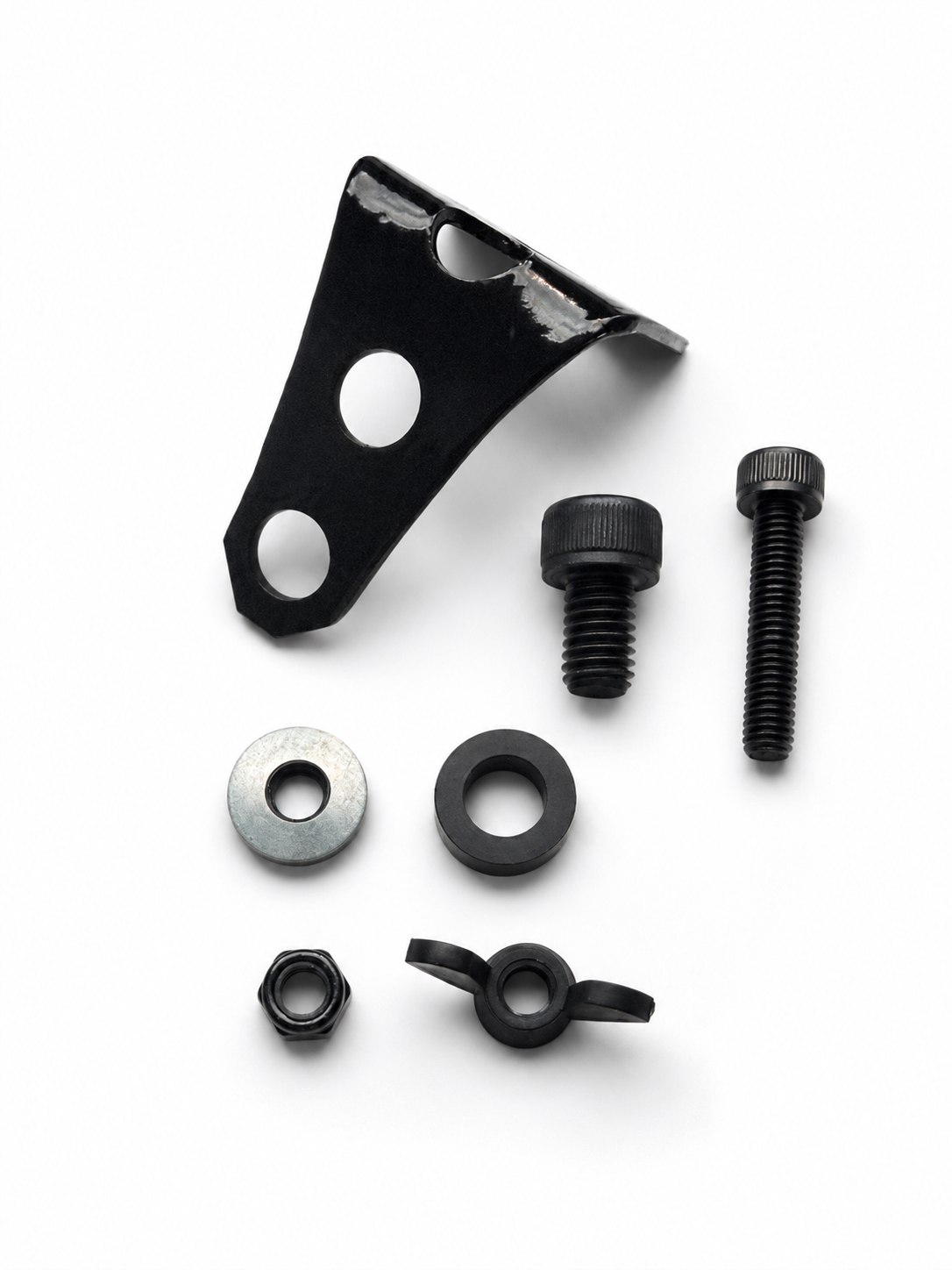 The Bracket Tree rear brake reservoir relocation kit for the 2024-2026 Yamaha MT-09 — bracket, mounting hardware, spacer, wing nut, and lock nut